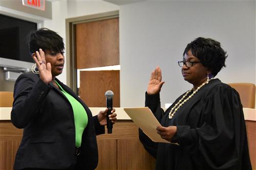 Joyce Wesley being sworn in by Judge Alice Gray